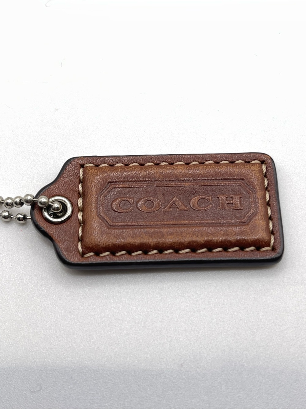 COACH Brown Leather Embossed Hang Tag